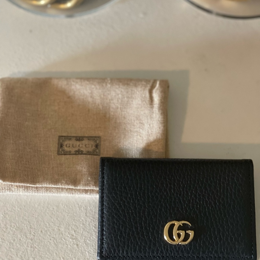 Gucci fold over wallet and card holder